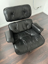 Fauteuil et repose-pieds Vitra Charles & Ray Eames