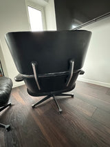Fauteuil et repose-pieds Vitra Charles & Ray Eames