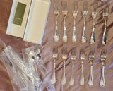 CHRISTOFLE Boîte 12 fourchettes métal argenté modèle RUBANS L=20,5 cm
