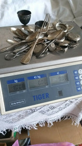 Lot d'argenterie diverse en argent massif 1kg008